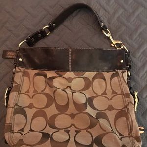 Signature Coach shoulder bag.